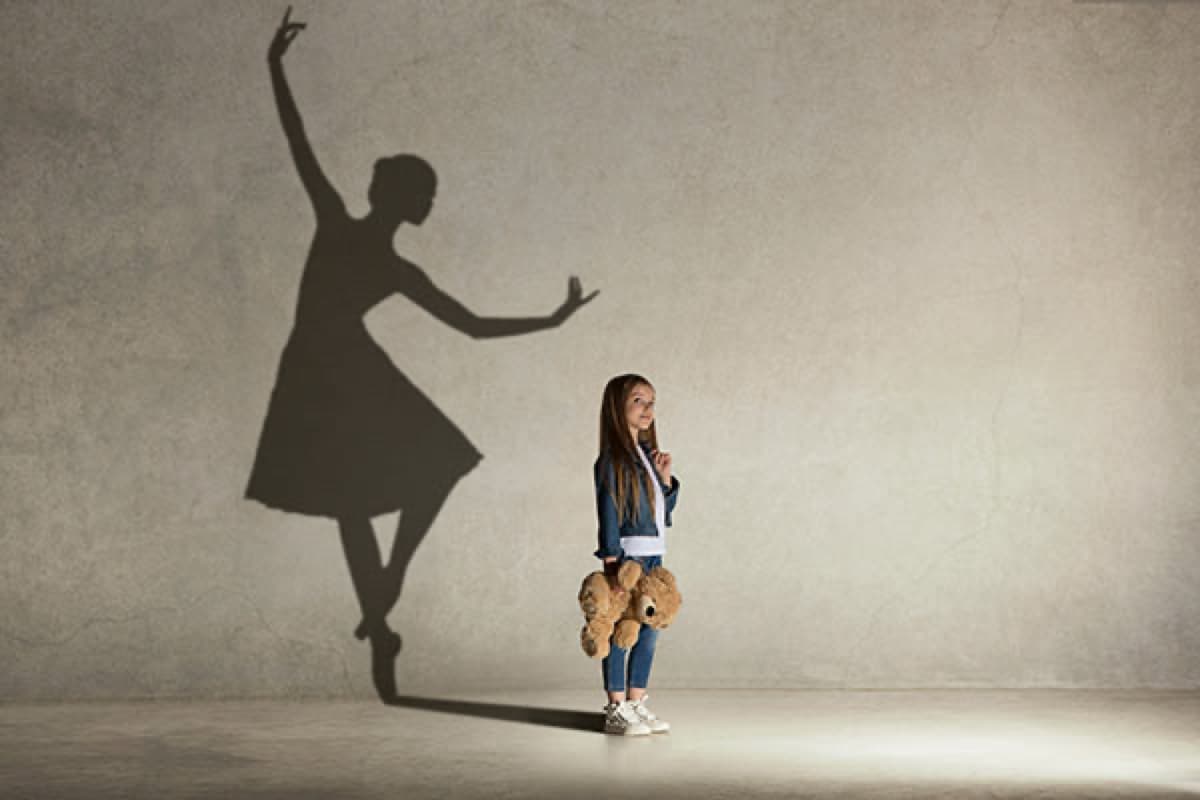 Young girl dreaming of ballet
